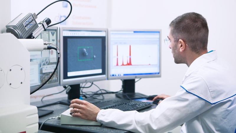 Scientist performing Analytical Test with SEM